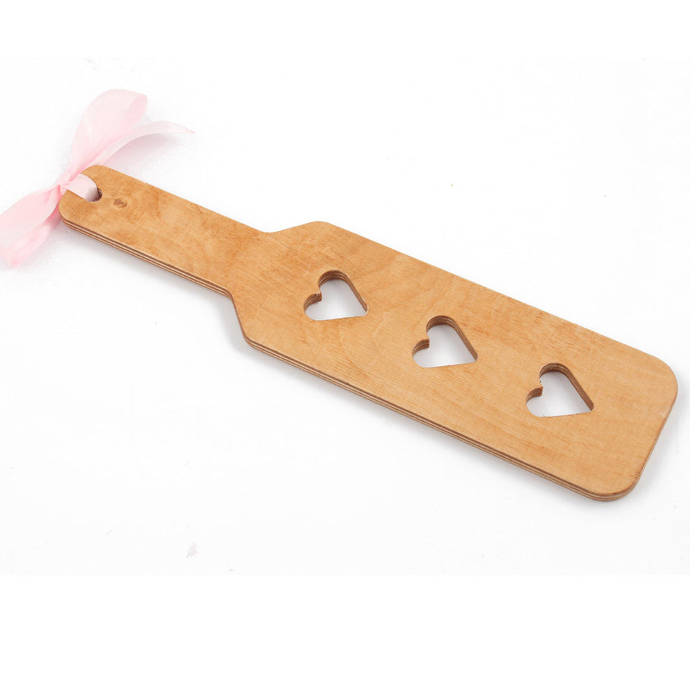 Using spanking paddles safely - tips and guides from DDLGLand