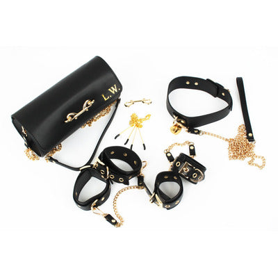 Black leather Bondage Kit with gold detail