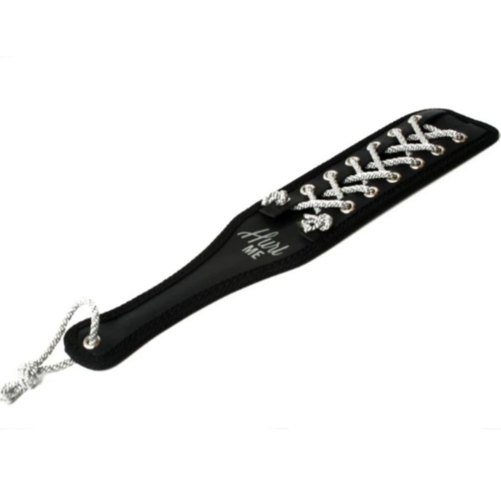 Black impact toy flogger with hurt me text and rope detail