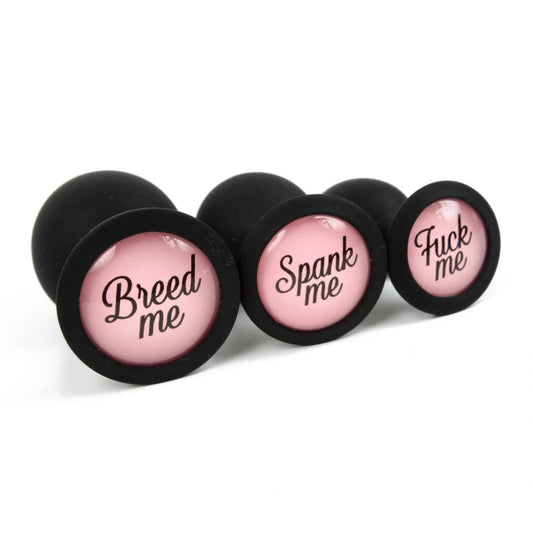 Black silicone anal plugs personalized with breed me, spank me, fuck me