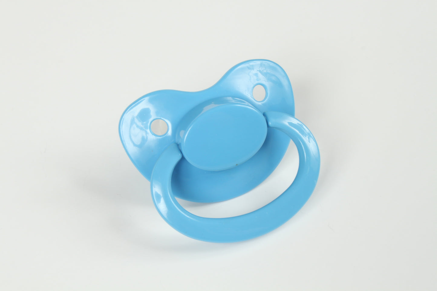 ABDL pacifier in baby blue with large silicone teat