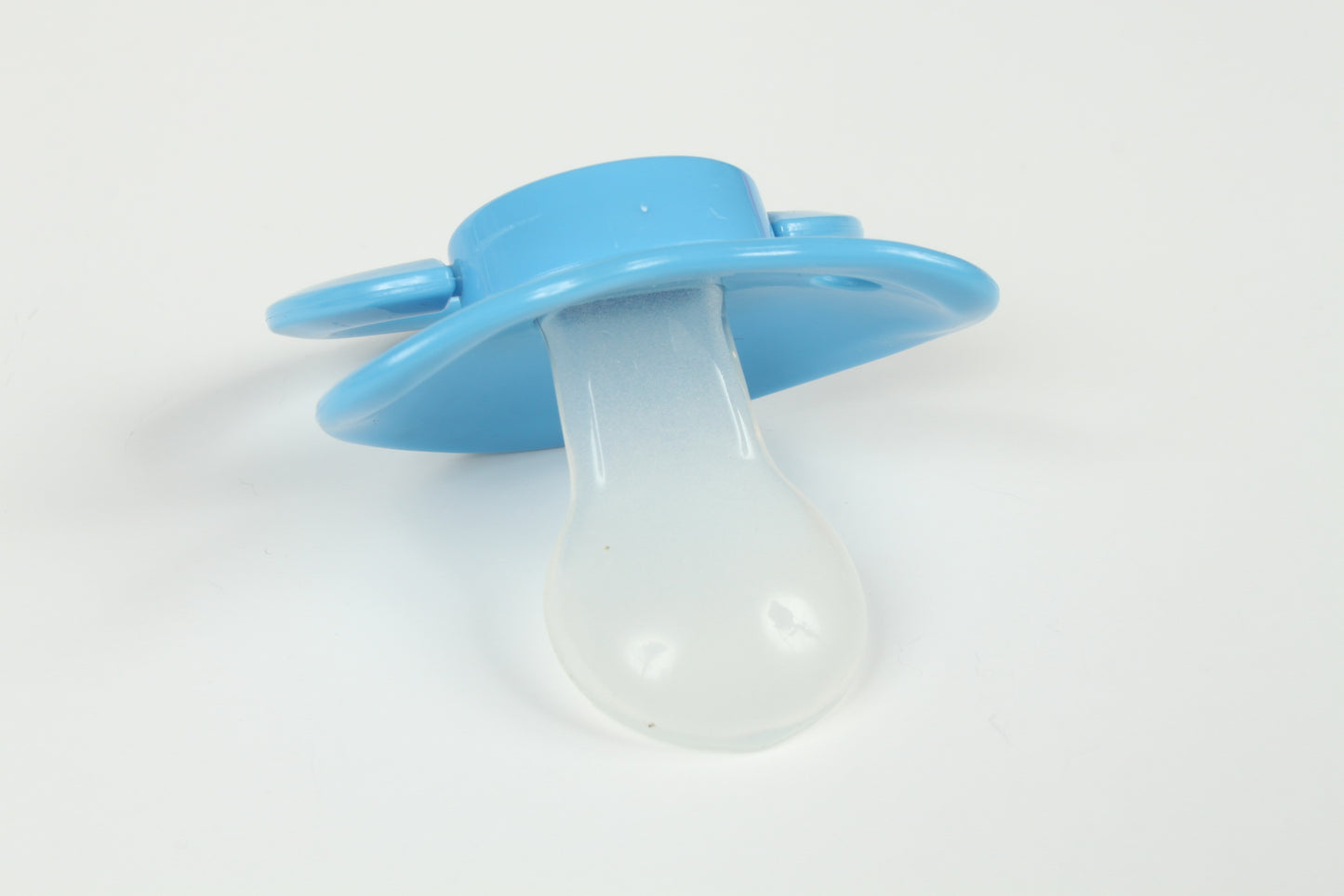 Adult baby pacifier in calming blue for ageplay or kink