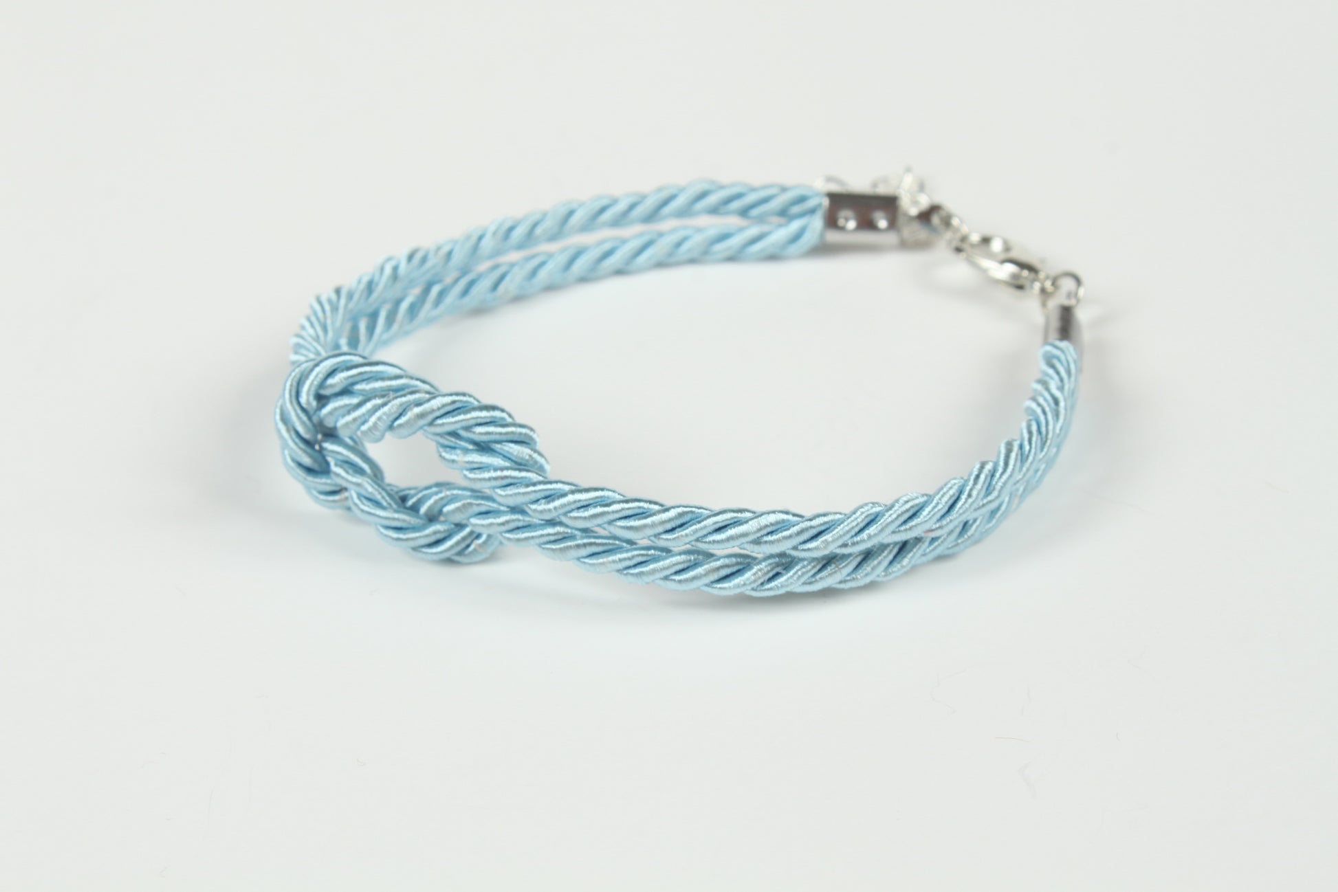 Close-up of double twisted cord bracelet with bondage knot
