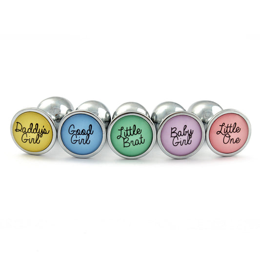 Butt Plugs for Little Space with quotes daddy's girl, good girl, litle brat, baby girl and little one in pastel colours