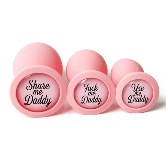 personalized silicone butt plugs in pink with quotes share me daddy, fuck me daddy, use me daddy