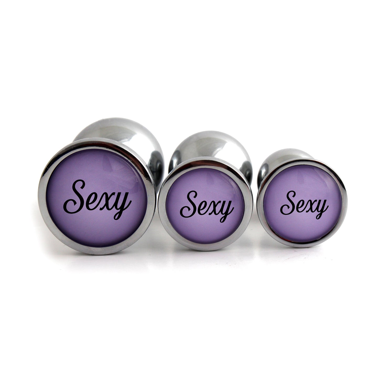 Sexy Butt Plugs - set of 3 anal plugs with purple toppers with the word "sexy"